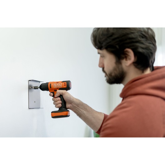 BLACK+DECKER screwdriver application with hand/person included