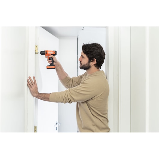 BLACK+DECKER screwdriver application with hand/person included