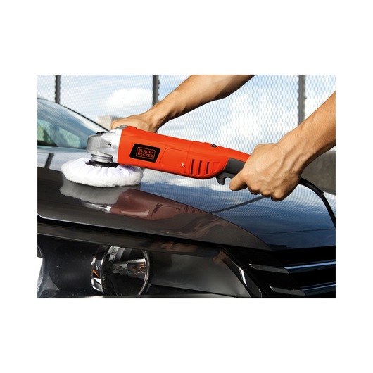 BLACKDECKER WP1500K car polisher in use on vehicle hood, red and black electric tool, photography.